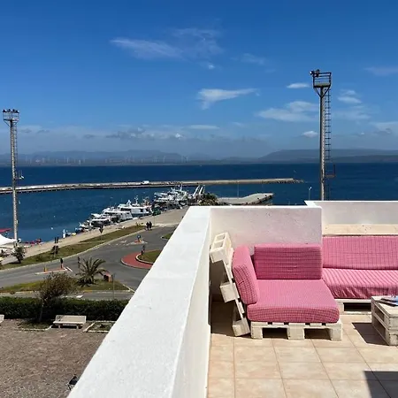Апартаменты Attici Con Terrazzo Vista Mare Калазетта