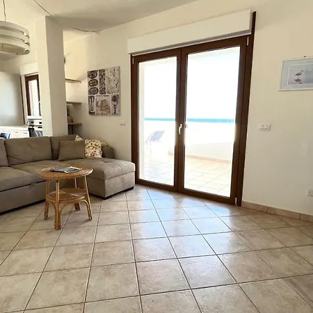 Апартаменты Attici Con Terrazzo Vista Mare